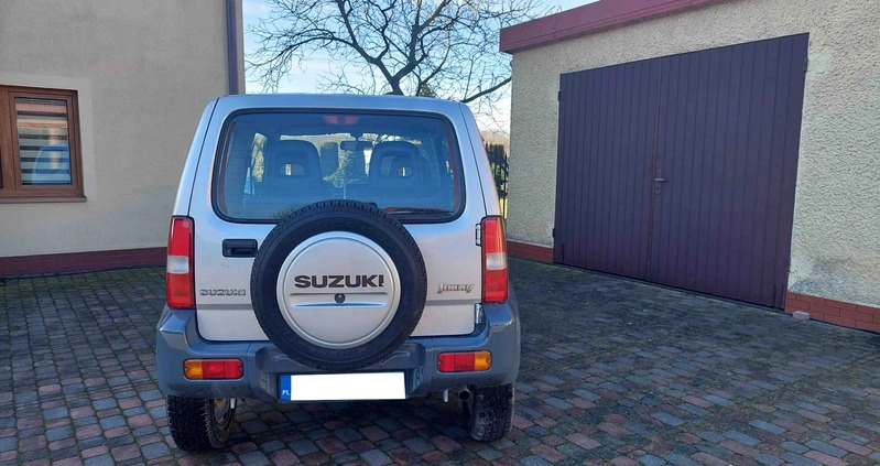 Suzuki Jimny cena 35700 przebieg: 155460, rok produkcji 2011 z Nidzica małe 211